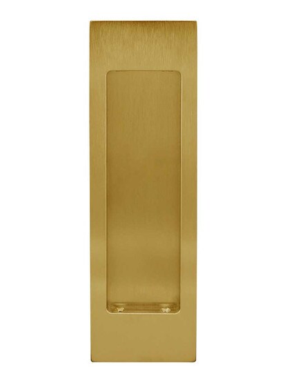 Rectangular Pocket-Door Flush Pull in Aged Brass.